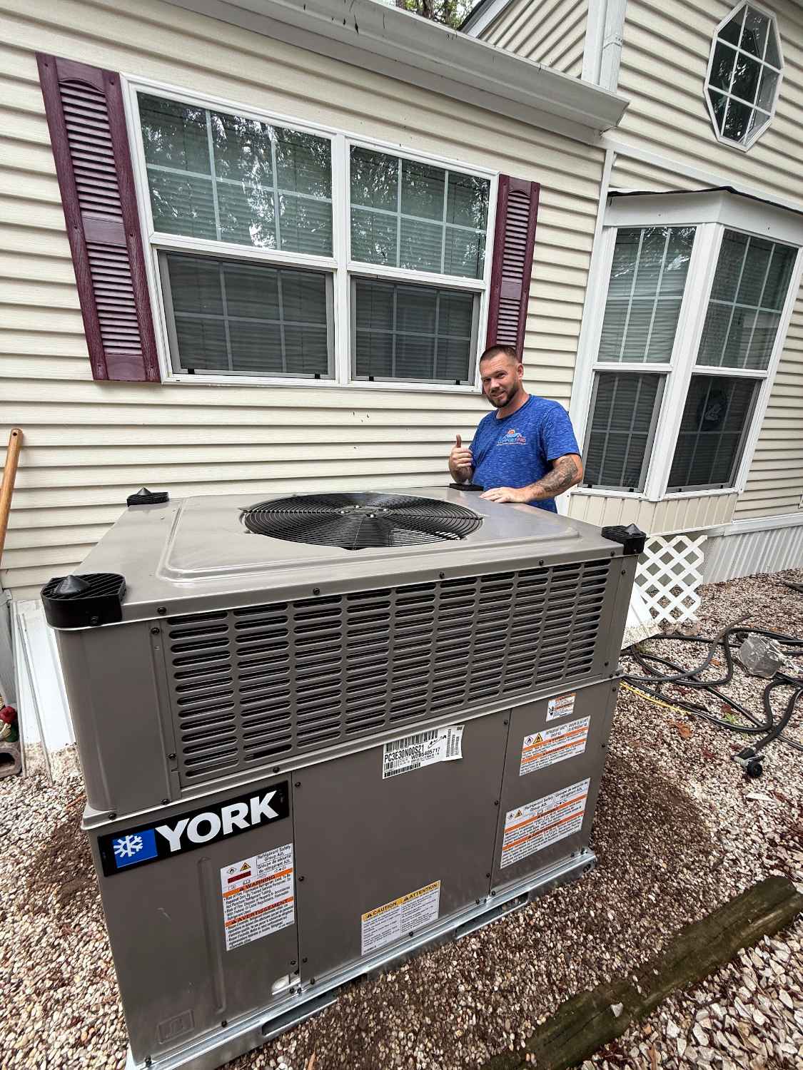 Comfort Pro technician with a York packaged unit at a Wildwood NJ home