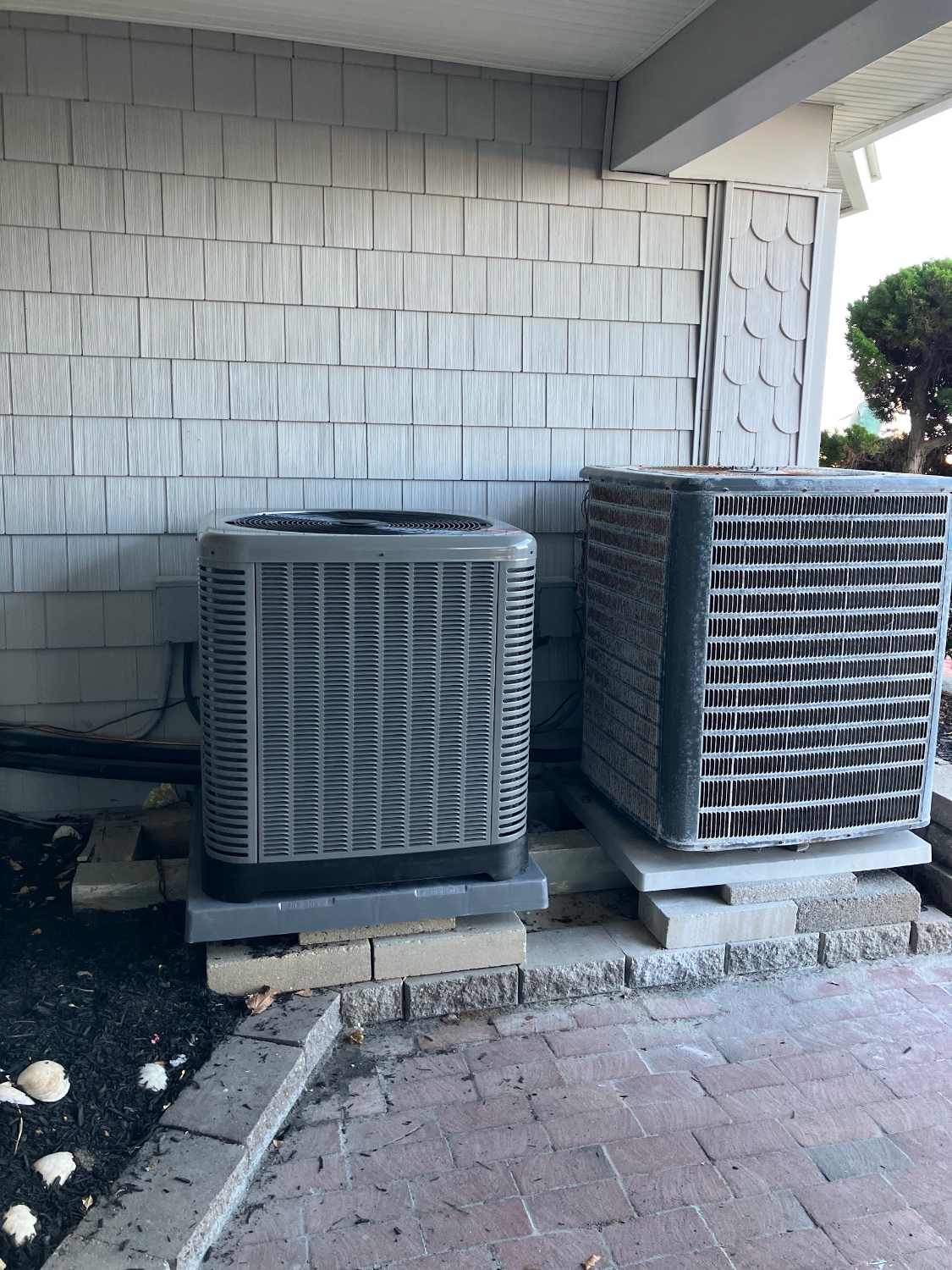 Two new AC condensers installed on pads by Comfort Pro in Cape May County NJ